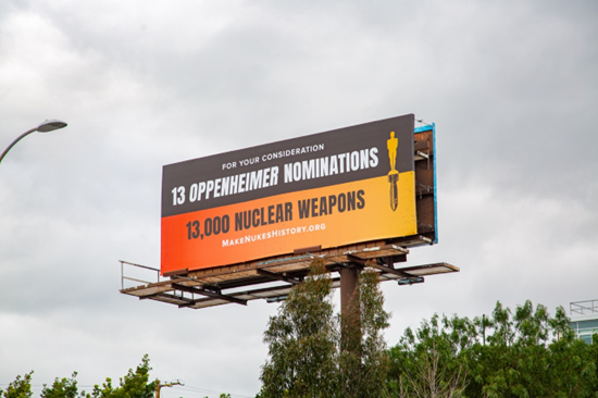 Billboard that says: For your considerarion 13 Oppenheimer nominations. 13,000 nuclear weapons. Makenukeshistory.org